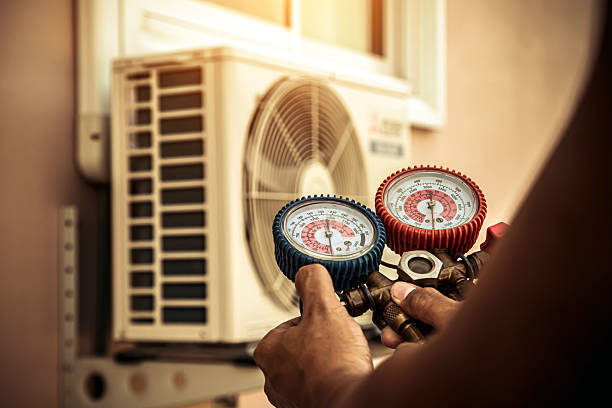 Professional Hvac technician working in Bokeelia, FL